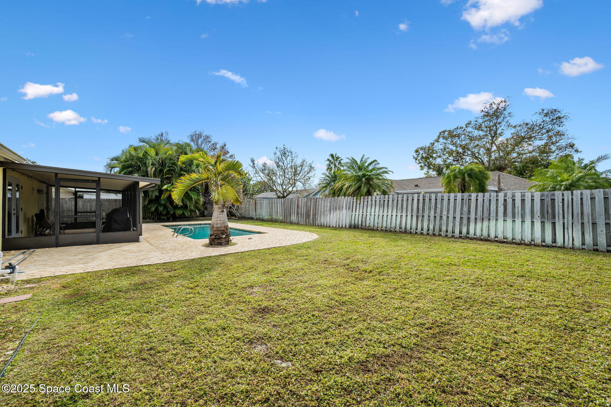 2568 Longwood Boulevard Melbourne, FL 32934 - Photo 41 of 42 a view of a garden and basketball court