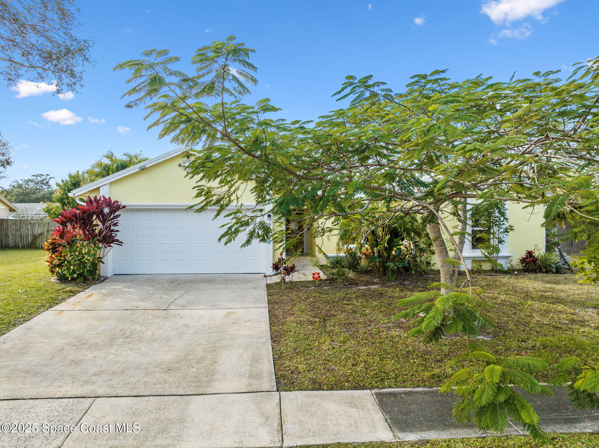 2568 Longwood Boulevard Melbourne, FL 32934 - Photo 7 of 42 a view of a yard with an outdoor space