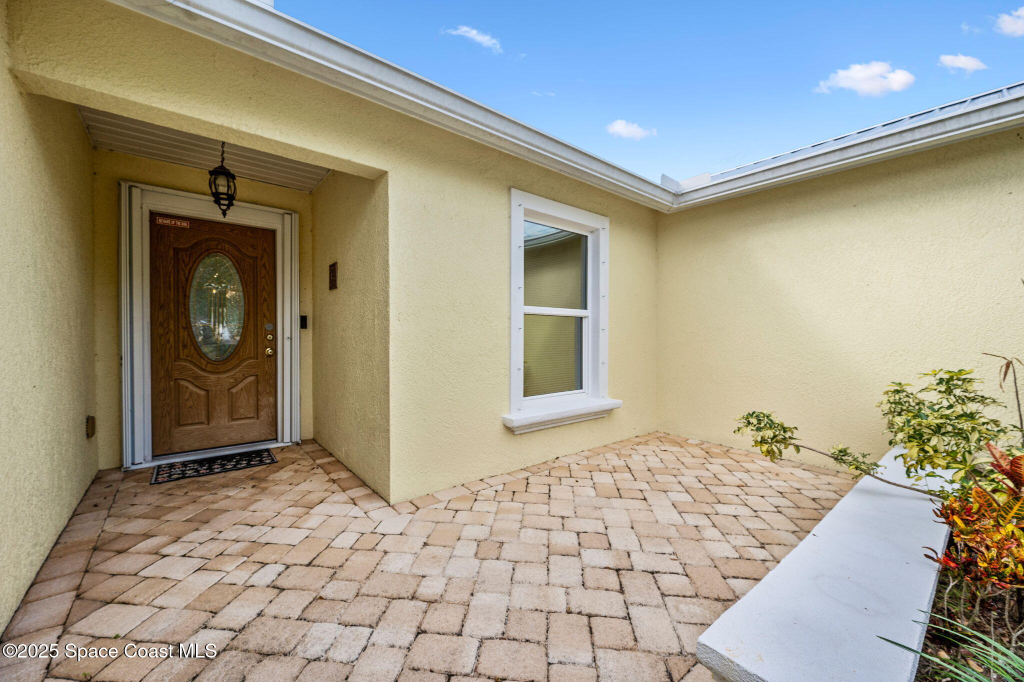 2568 Longwood Boulevard Melbourne, FL 32934 - Photo 8 of 42 a view of a entryway door