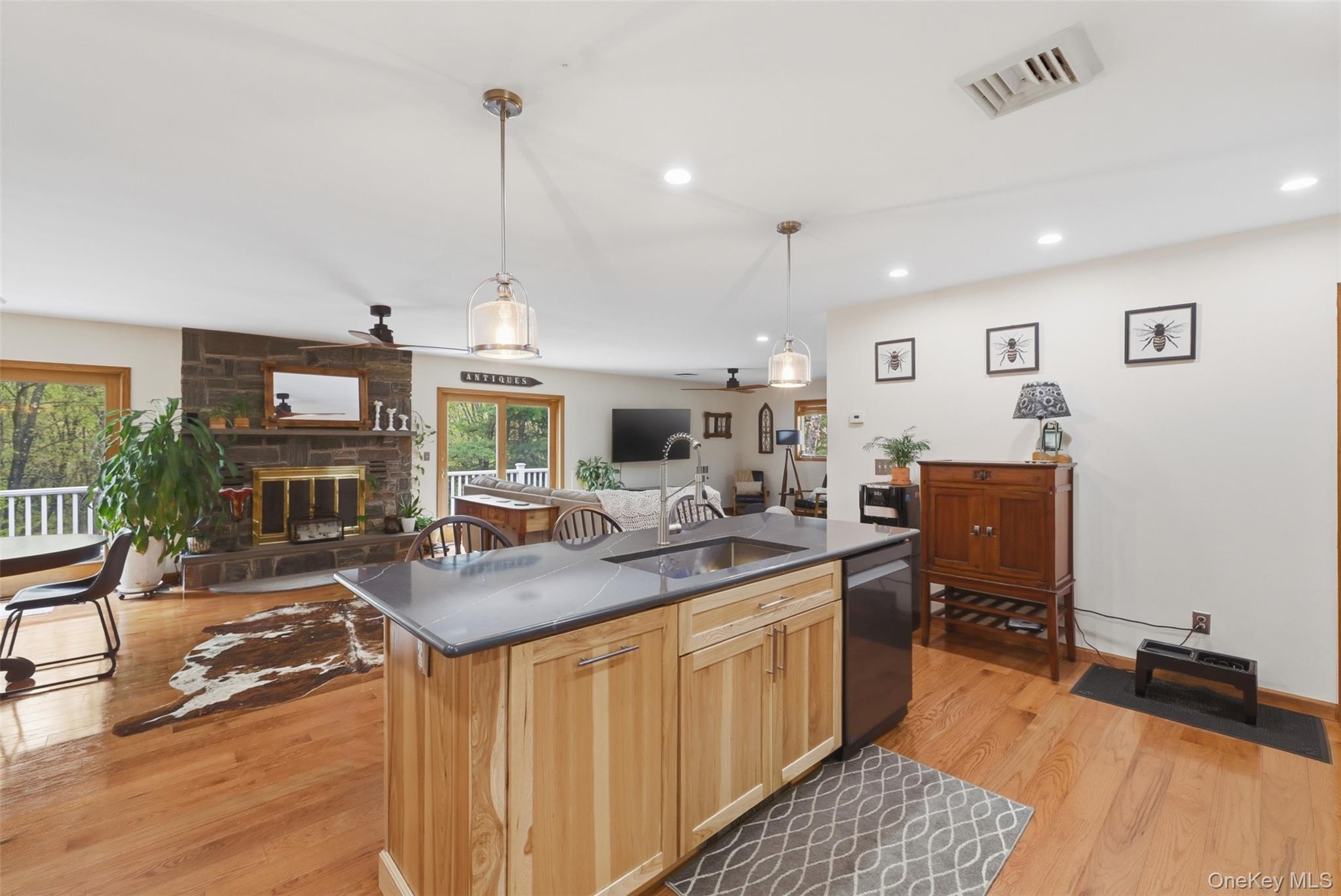 128 Sawmill Road Red Hook, NY 12571 - Photo 11 of 40 a kitchen with sink refrigerator and cabinets