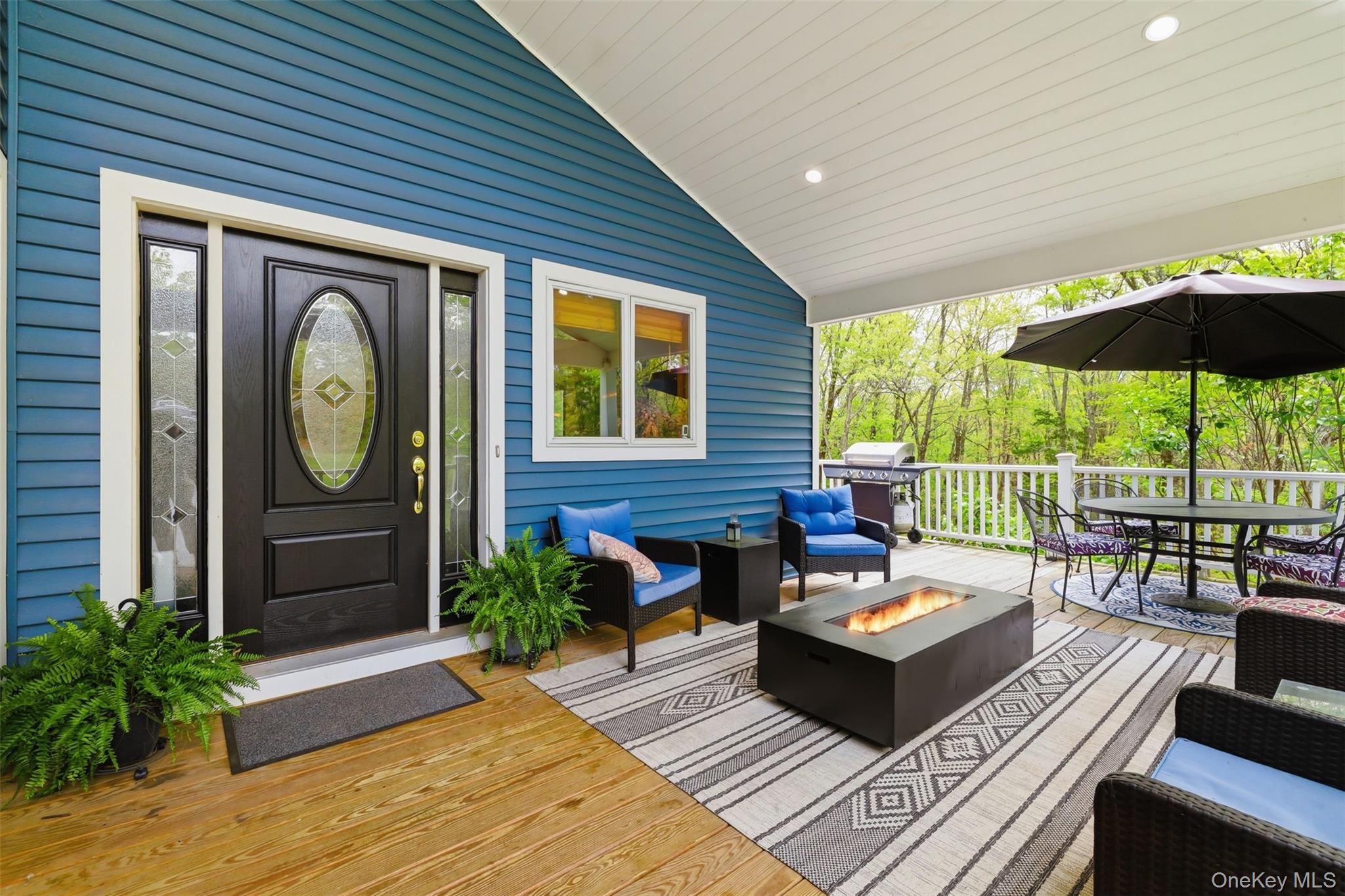 128 Sawmill Road Red Hook, NY 12571 - Photo 2 of 40 a outdoor space with patio the couches and a potted plant