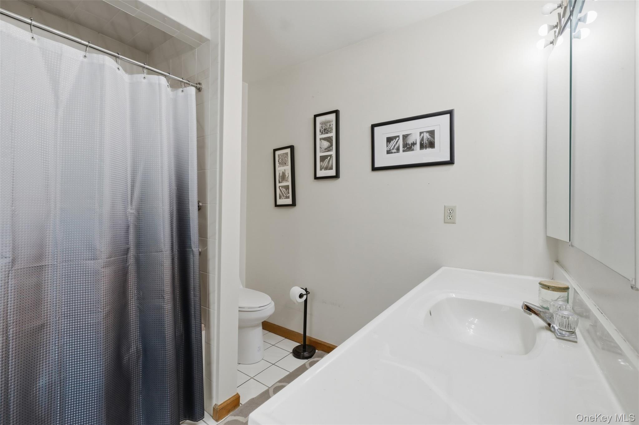 128 Sawmill Road Red Hook, NY 12571 - Photo 22 of 40 a bathroom with a sink and a tub