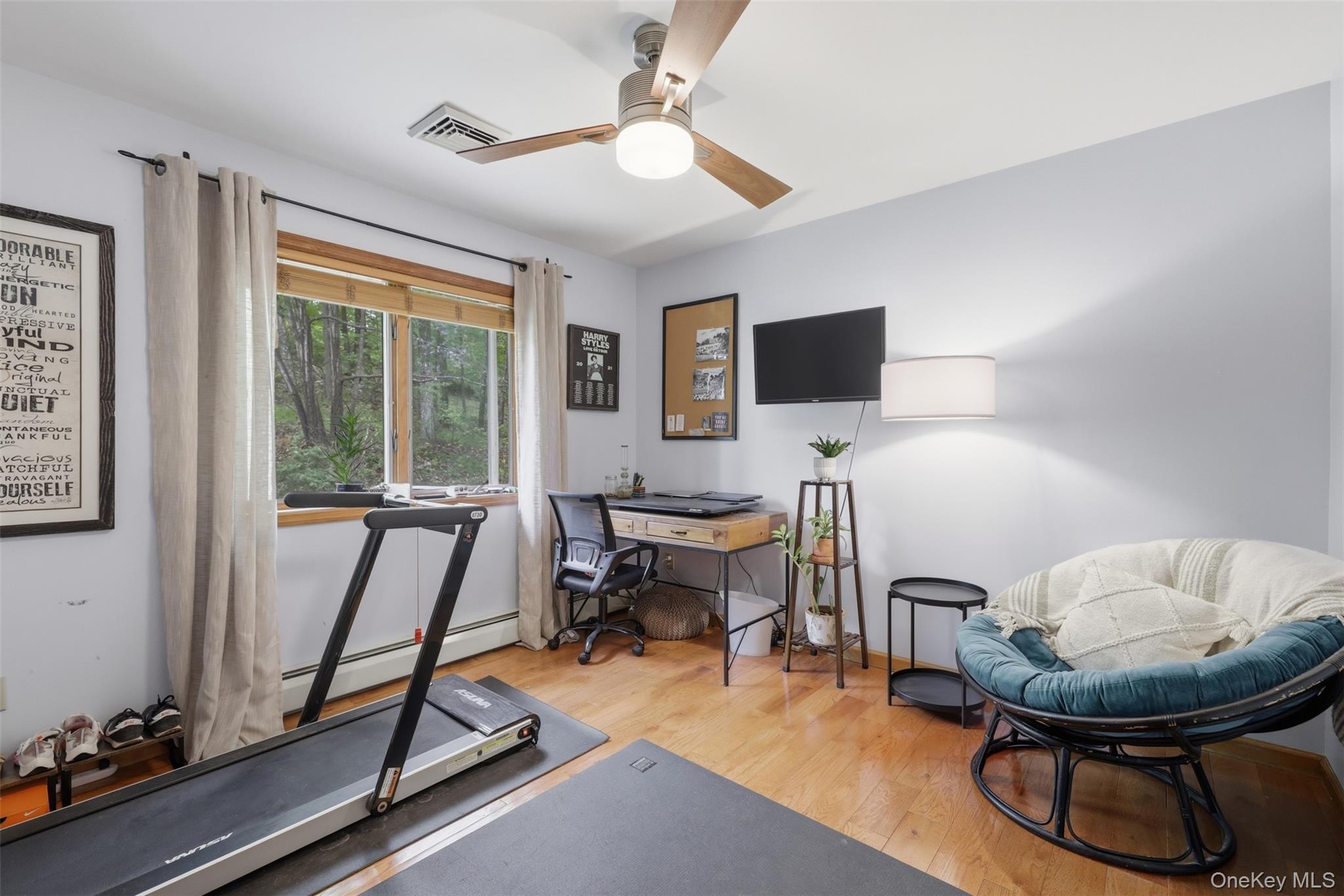 128 Sawmill Road Red Hook, NY 12571 - Photo 23 of 40 a work room with furniture and a flat screen tv