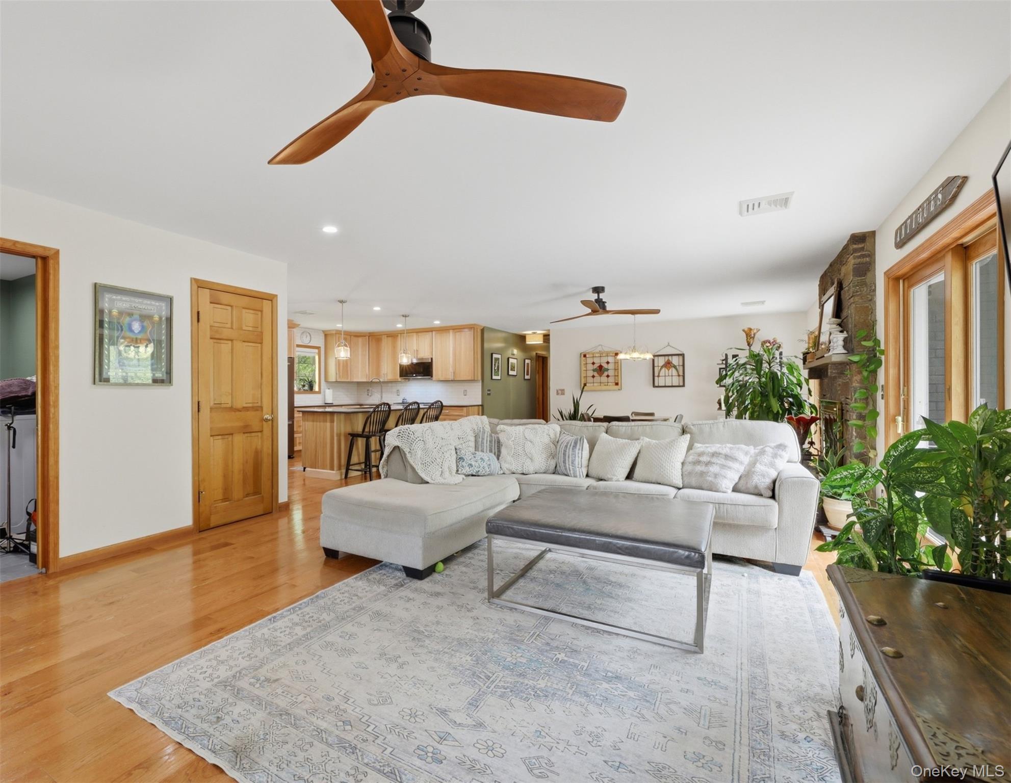 128 Sawmill Road Red Hook, NY 12571 - Photo 3 of 40 a living room with furniture and a wooden floor