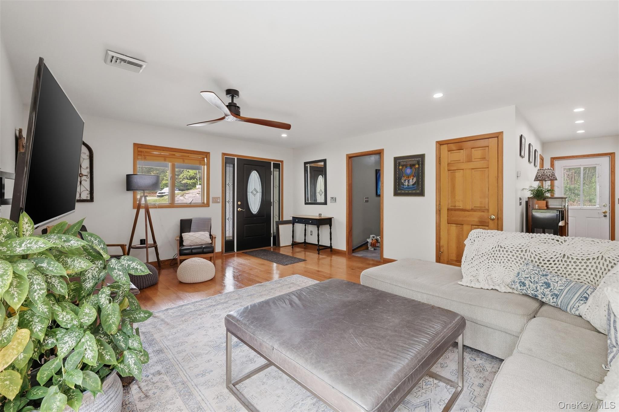 128 Sawmill Road Red Hook, NY 12571 - Photo 5 of 40 a living room with furniture and a flat screen tv