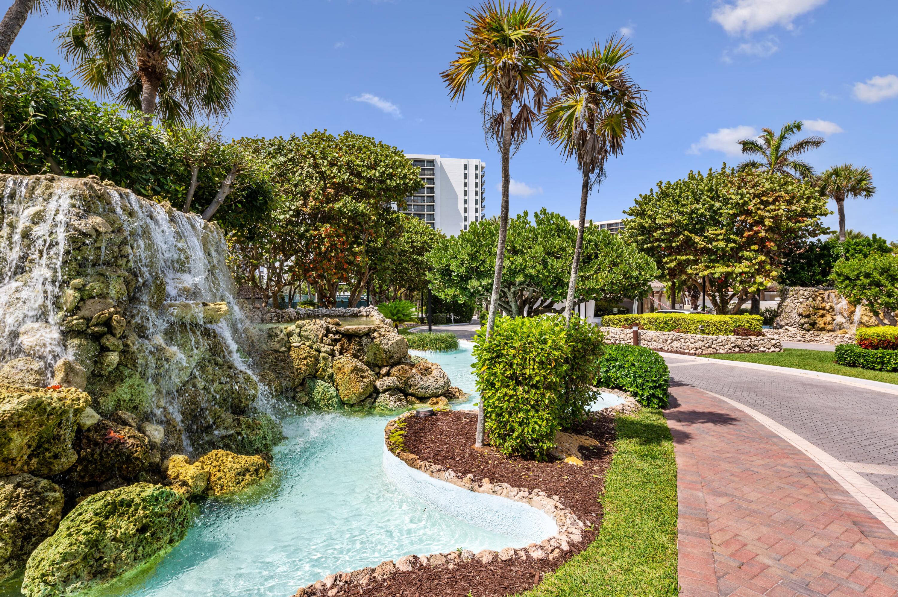 4748 South Ocean Boulevard, Unit 802 Highland Beach, FL 33487 - Photo 21 of 27 a view of a garden with a flower garden