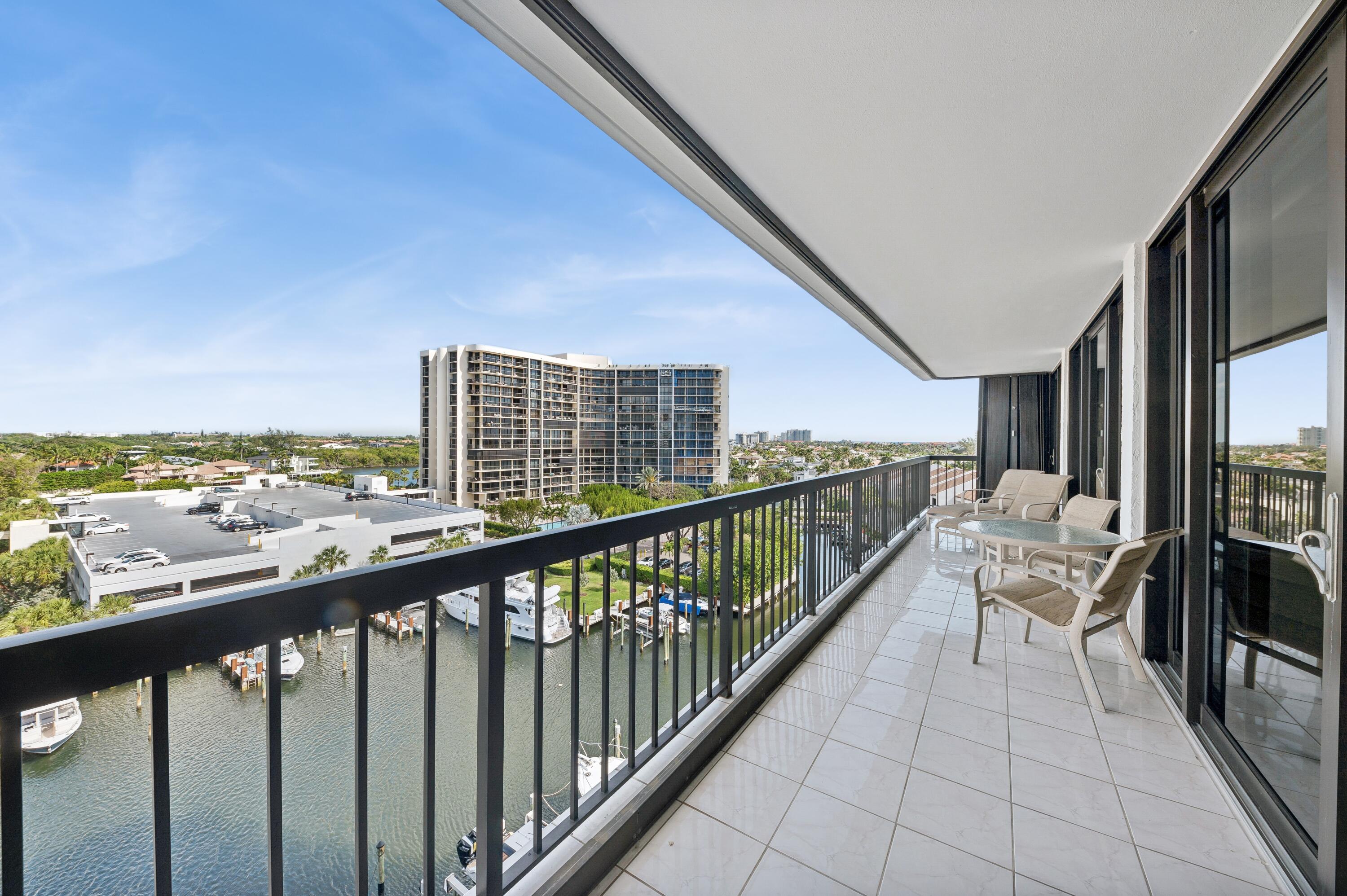 4748 South Ocean Boulevard, Unit 802 Highland Beach, FL 33487 - Photo 3 of 27 a balcony with view of city
