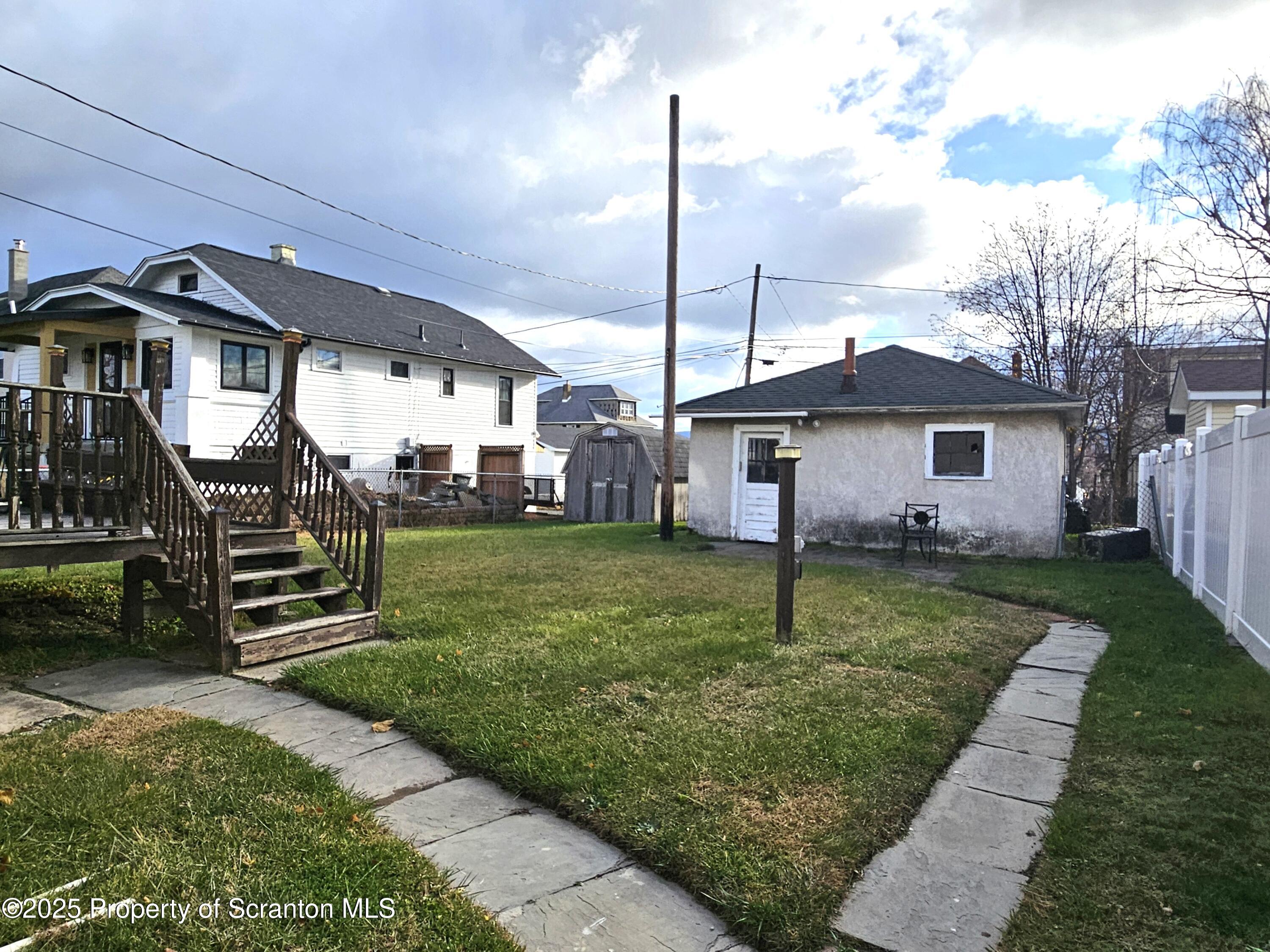 852 North Rebecca Avenue, Unit 2 Scranton, PA 18504 - Photo 12 of 13 a house view with a sitting space and garden