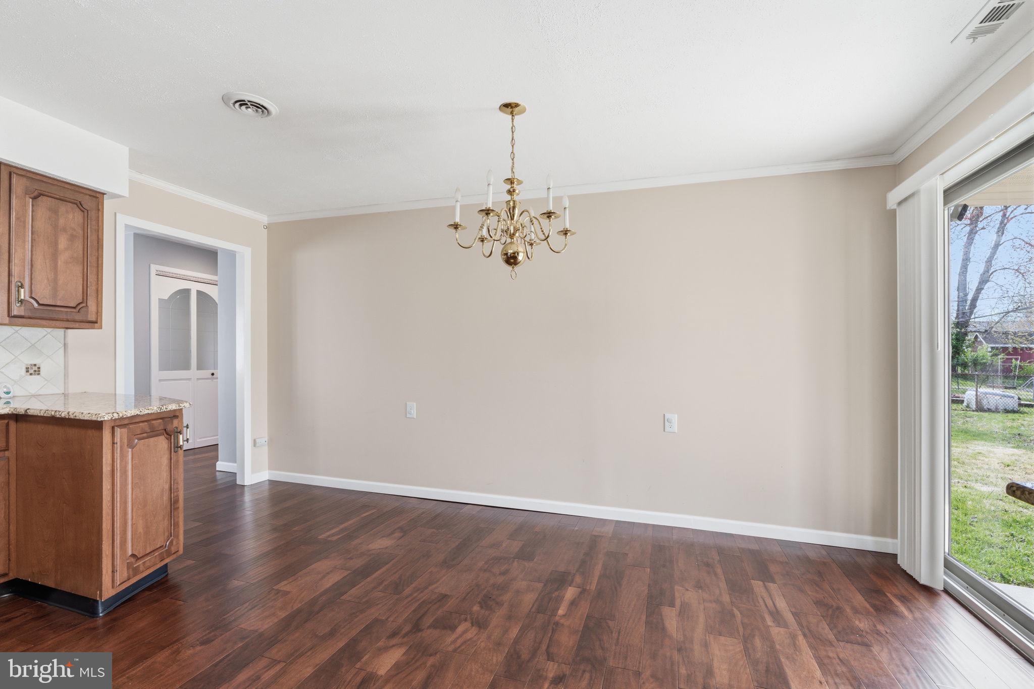 802 Eldridge Road Fairless Hills, PA 19030 - Photo 18 of 32 a view of a room with wooden floor and large window