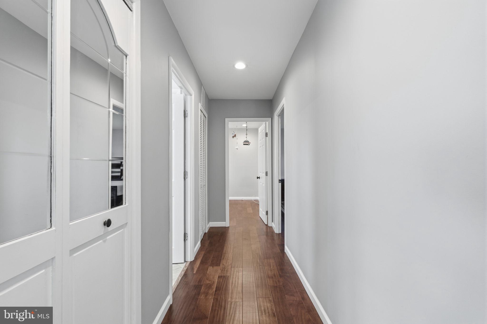 802 Eldridge Road Fairless Hills, PA 19030 - Photo 19 of 32 a view of a hallway with wooden floor
