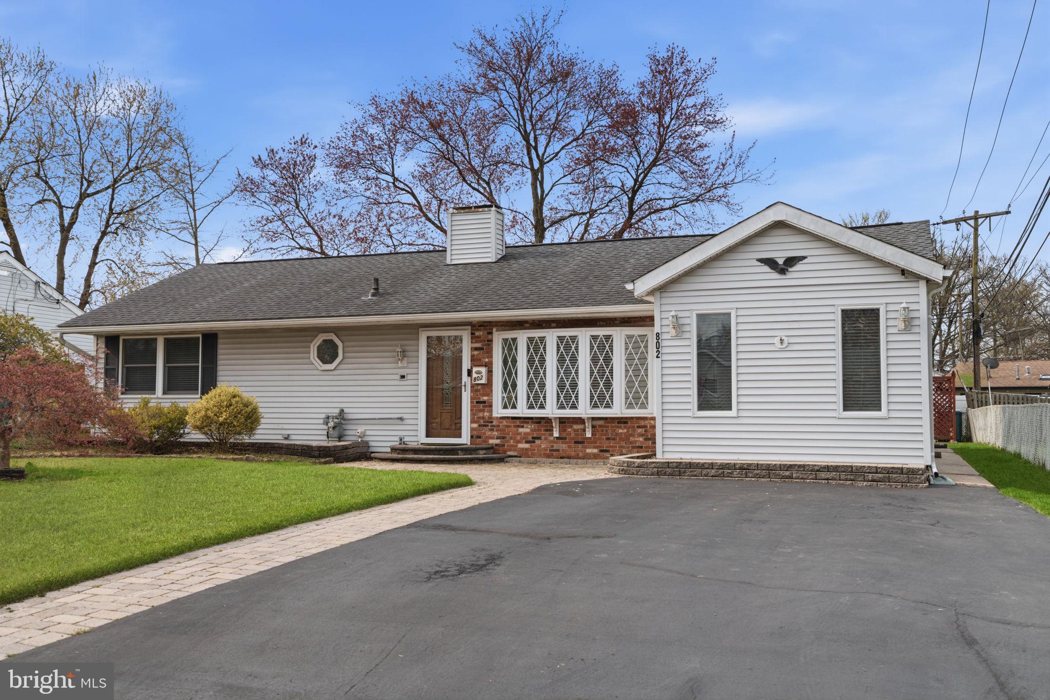 802 Eldridge Road Fairless Hills, PA 19030 - Photo 2 of 32 a front view of a house with a yard and garage