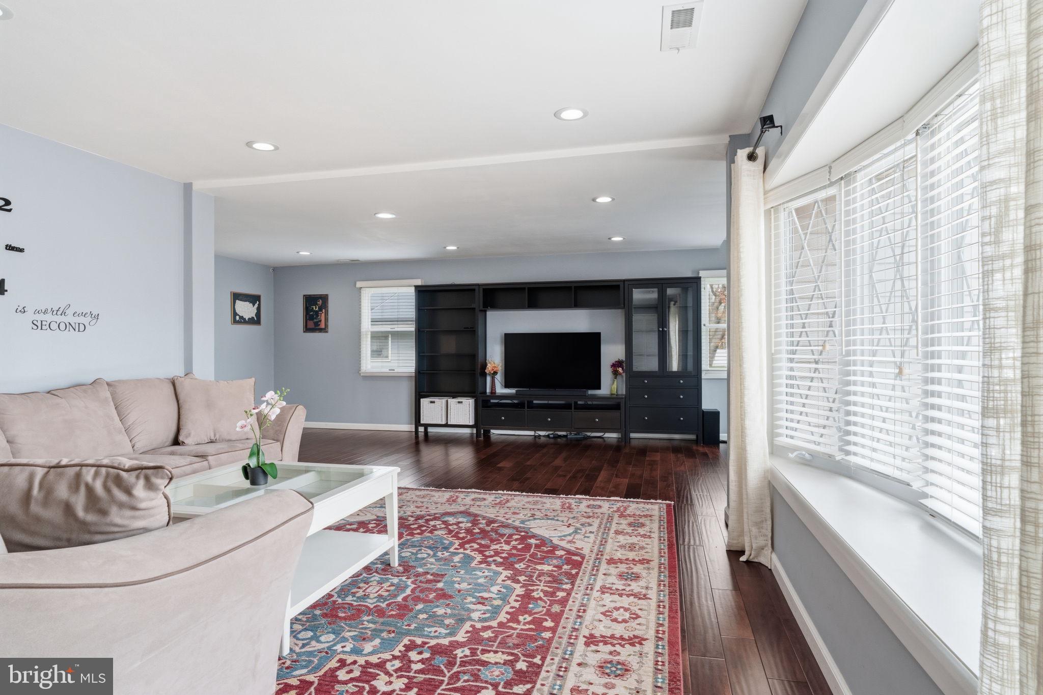 802 Eldridge Road Fairless Hills, PA 19030 - Photo 6 of 32 a living room with furniture and a flat screen tv