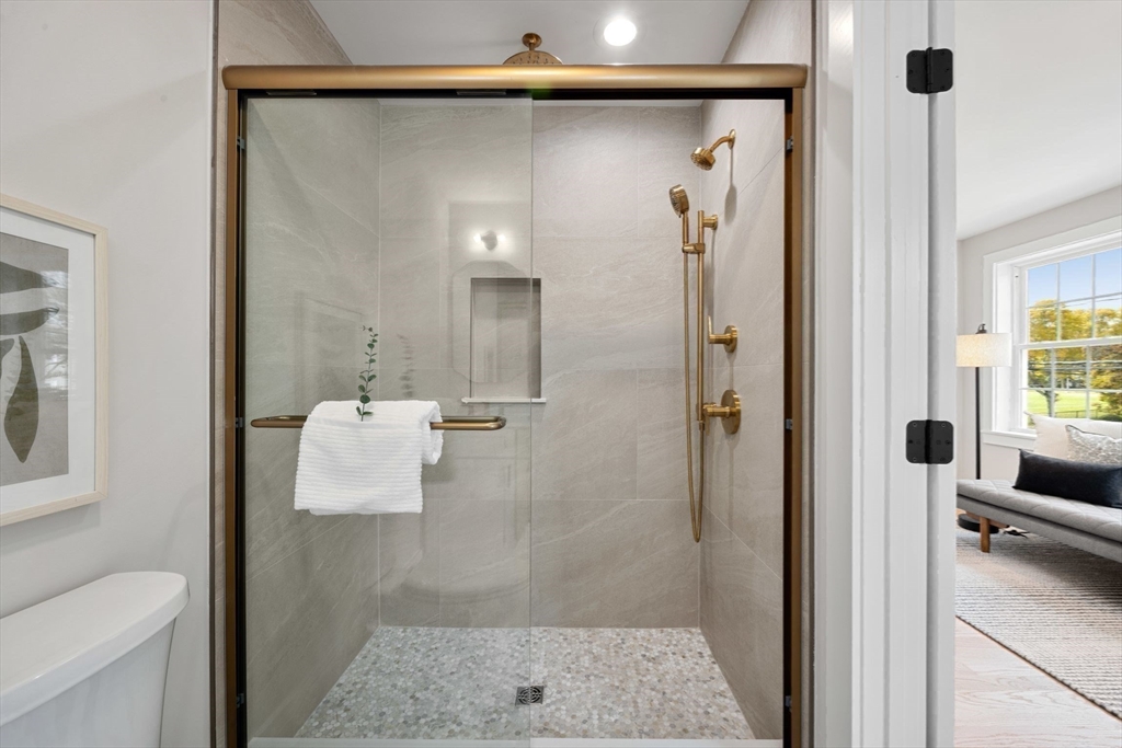 3-5 Victoria Road, Unit 3 Arlington, MA 02474 - Photo 27 of 36 a bathroom with a shower and a sink