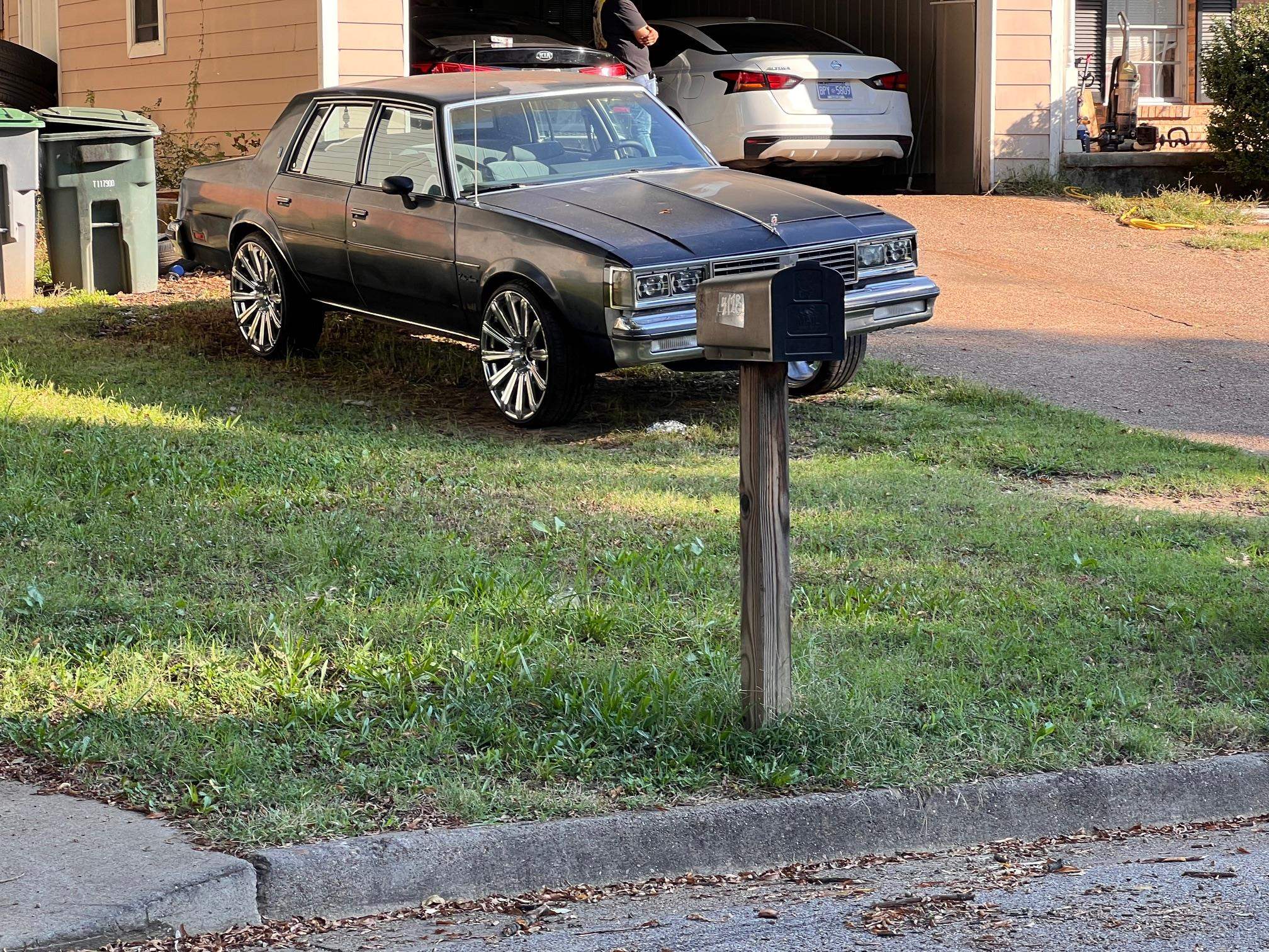 4178 Crain Road Memphis, TN 38128 - Photo 4 of 6 a car parked in front of a house