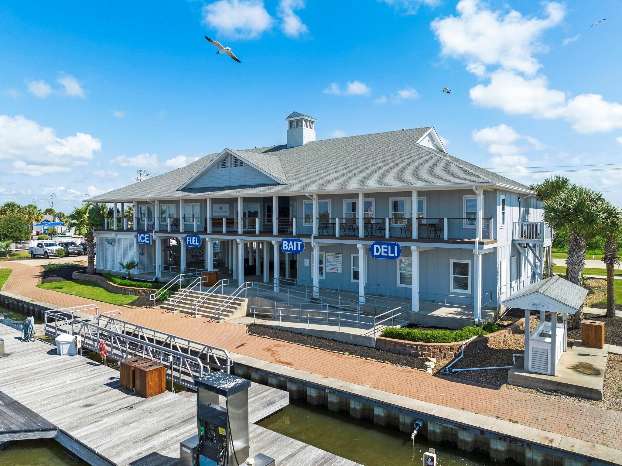 24 Long Key Hitchcock, TX 77563 - Photo 24 of 29 a view of a house with pool and chairs