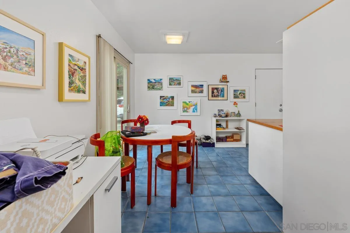4875 Academy Street San Diego, CA 92109 - Photo 13 of 33 a view of a dining room with furniture