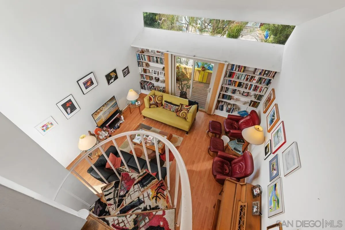 4875 Academy Street San Diego, CA 92109 - Photo 19 of 33 walk in closet with wooden floor