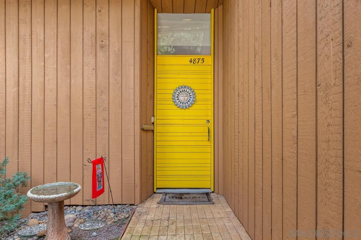 4875 Academy Street San Diego, CA 92109 - Photo 25 of 33 a bathroom with a shower and a toilet