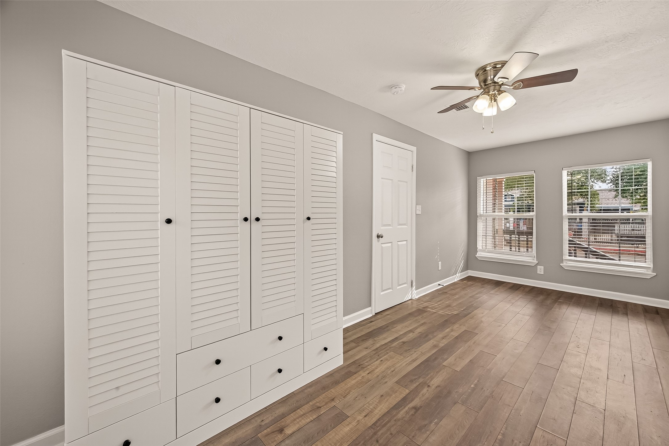 6615 Kernel Street Houston, TX 77087 - Photo 14 of 20 wooden floor in an empty room with a window
