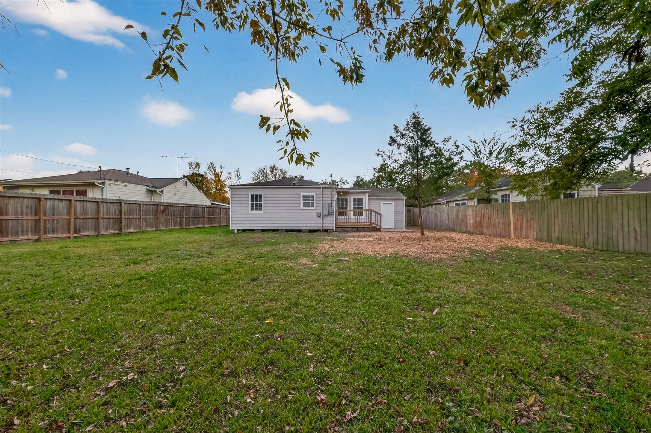 6615 Kernel Street Houston, TX 77087 - Photo 17 of 20 a view of a house with a backyard