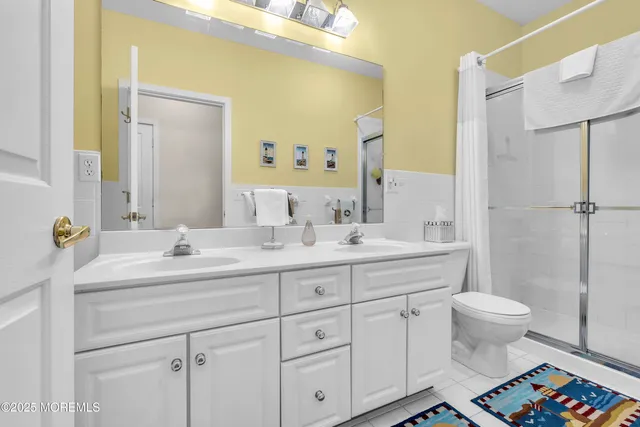 a bathroom with a bathtub and a sink