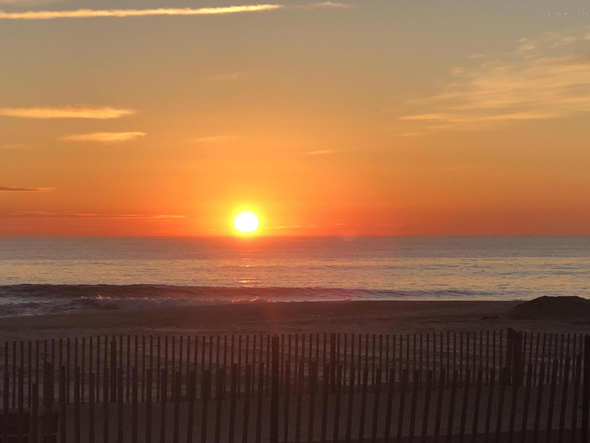 209 Beach Front, Unit 1 Manasquan, NJ 08736 - Photo 34 of 40 a view of an ocean and beach