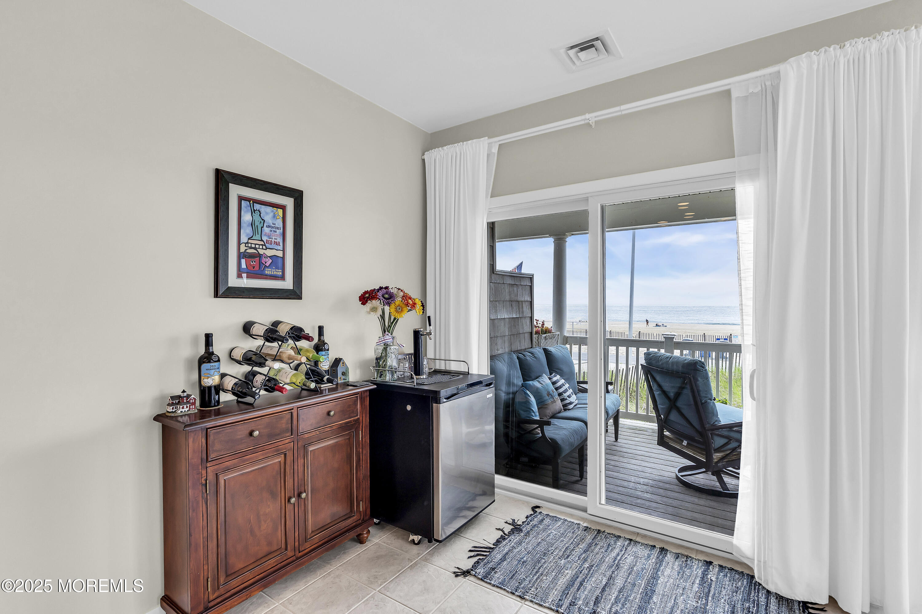 209 Beach Front, Unit 1 Manasquan, NJ 08736 - Photo 6 of 40 a room with furniture