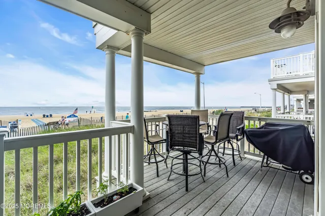 a view of a chairs and table on the deck