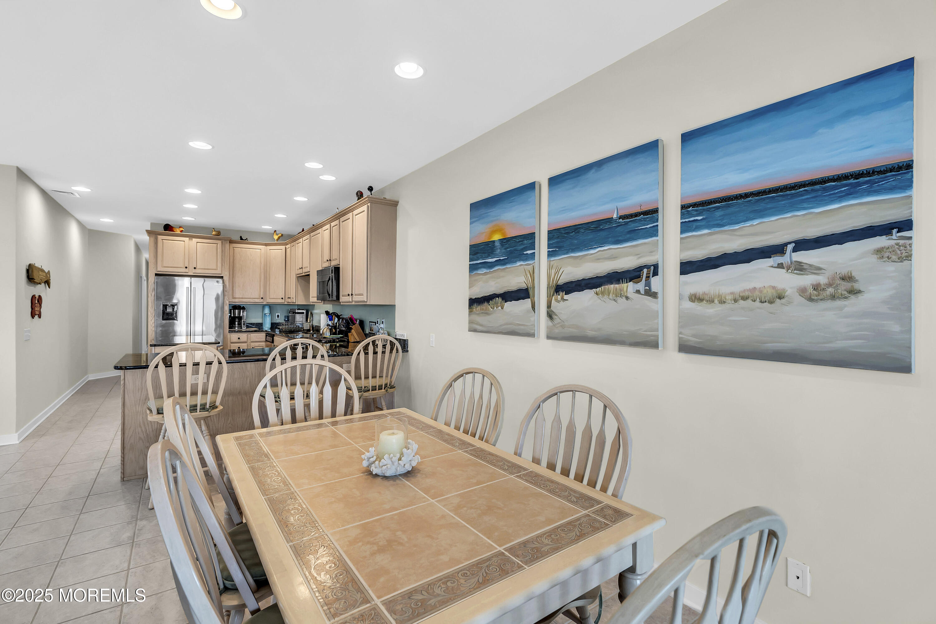 209 Beach Front, Unit 1 Manasquan, NJ 08736 - Photo 10 of 40 a view of a dining room with furniture