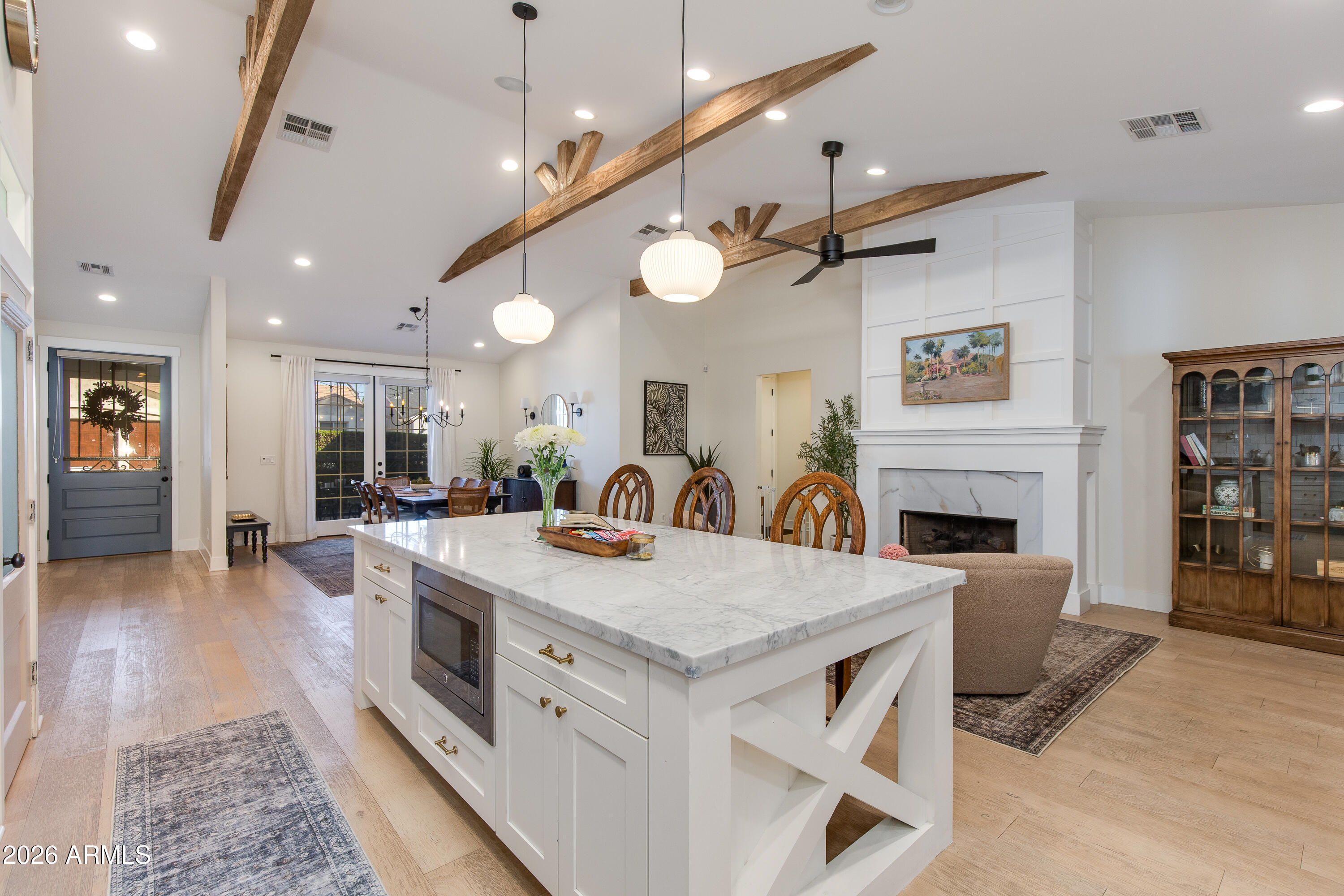 3247 East Sells Drive Phoenix, AZ 85018 - Photo 9 of 26 Kitchen island with Marble Countertop