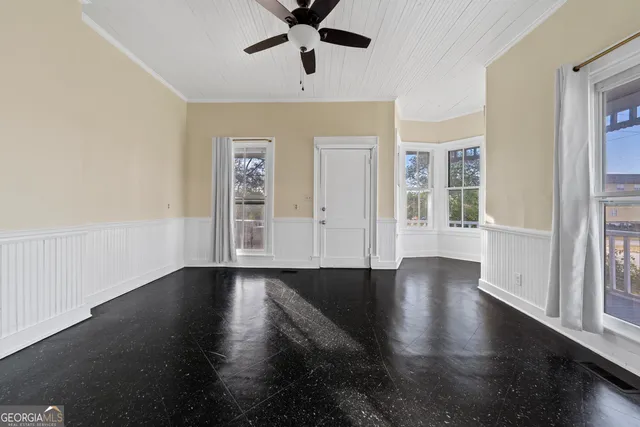 a kitchen with a refrigerator stove and microwave