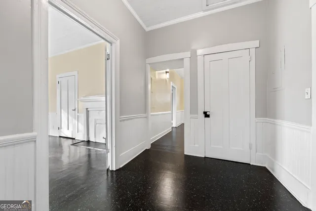 a kitchen with a sink a stove top oven a refrigerator and cabinets