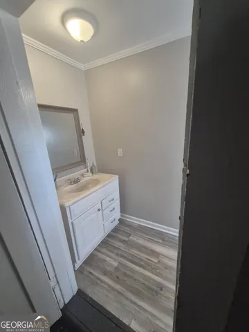 a view of a house with backyard and deck