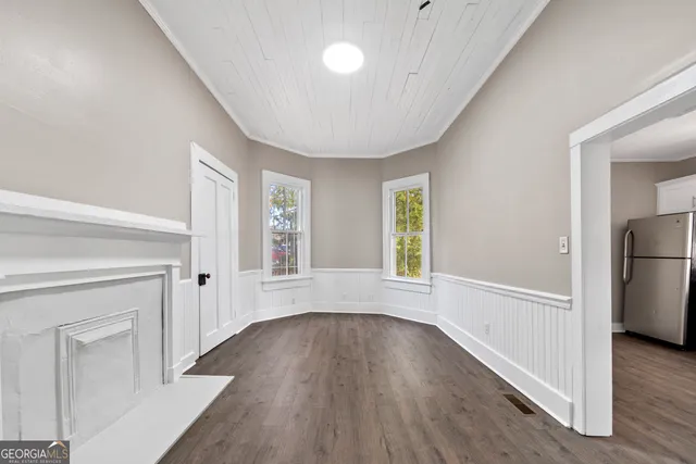 a bathroom with a sink vanity and a mirror