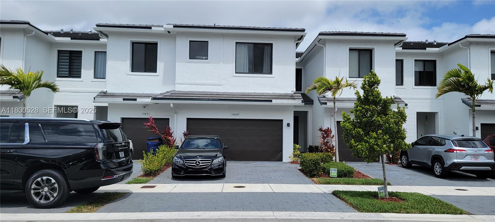 a car parked in front of a house