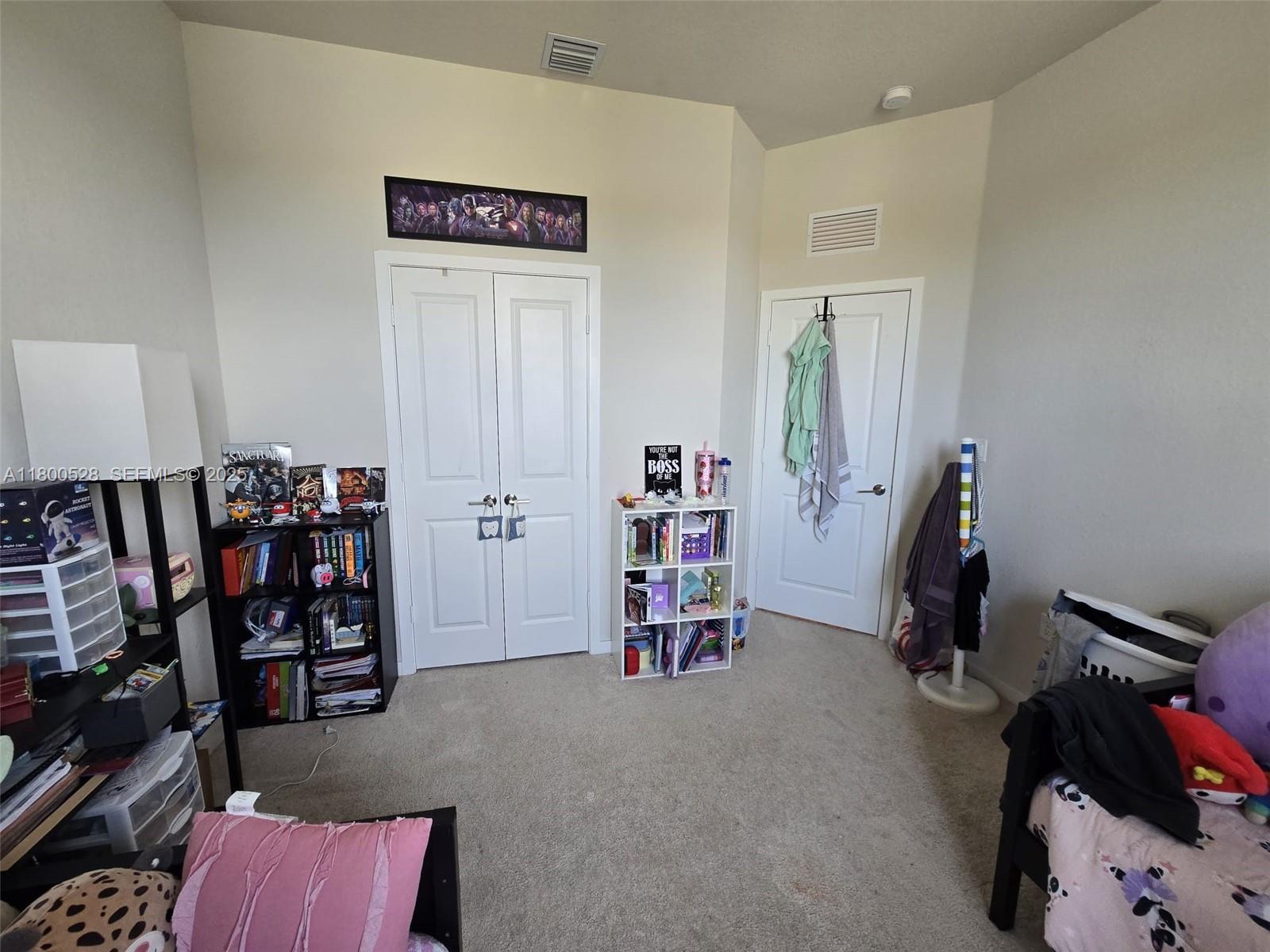 10847 Southwest 232nd Terrace Homestead, FL 33032 - Photo 18 of 29 a view of a room with gym equipment