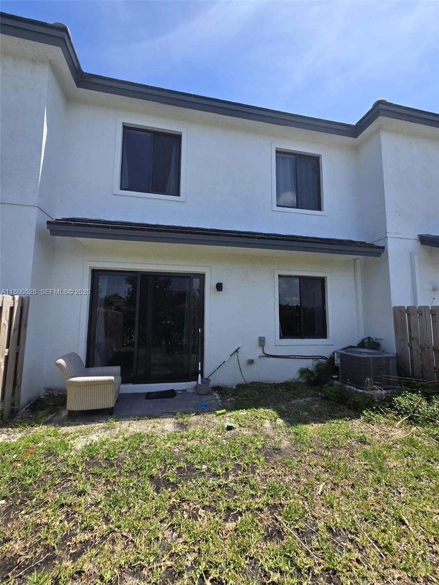 10847 Southwest 232nd Terrace Homestead, FL 33032 - Photo 27 of 29 a house view with a backyard space