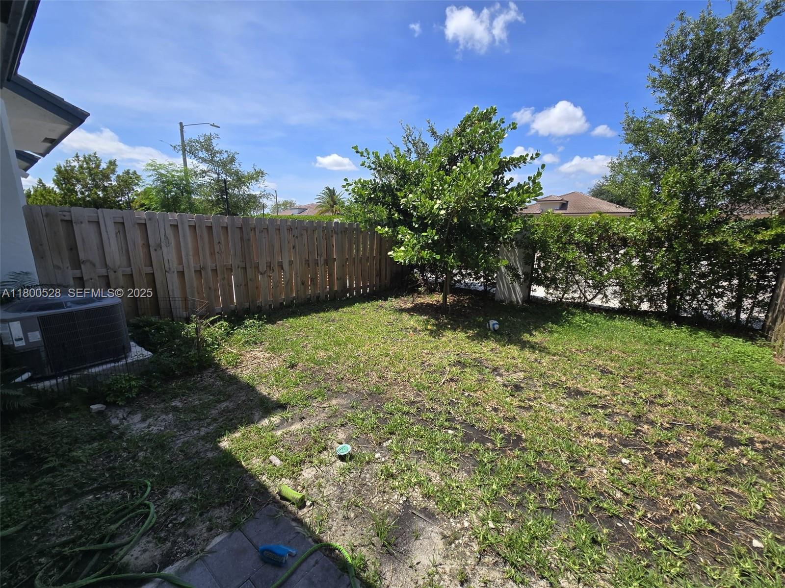 10847 Southwest 232nd Terrace Homestead, FL 33032 - Photo 28 of 29 a view of a backyard