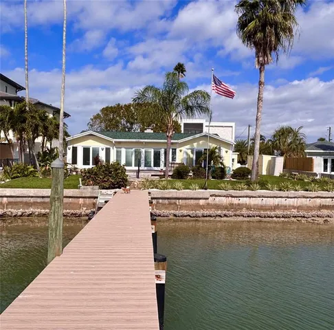 a view of a lake with a garden