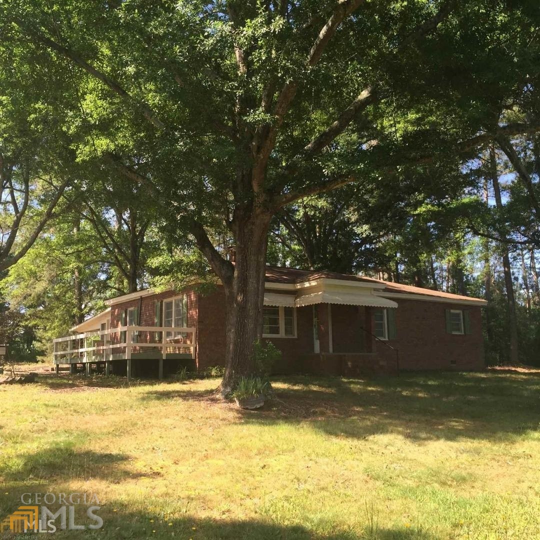 1930 Athens Road Royston, GA 30662 - Photo 1 of 1 a view of a house with a yard