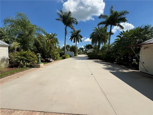 a view of a backyard of a house