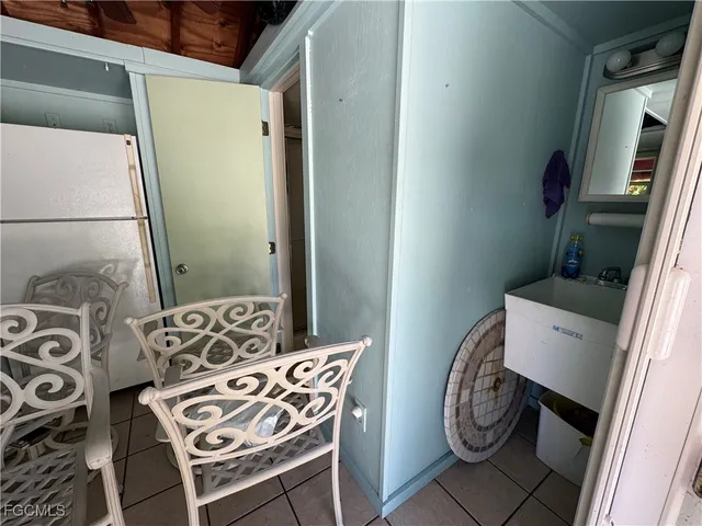 a bedroom with a bed and a table in it