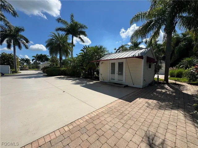 a view of a backyard of a house