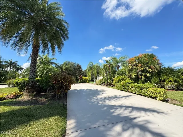 a view of a backyard of a house