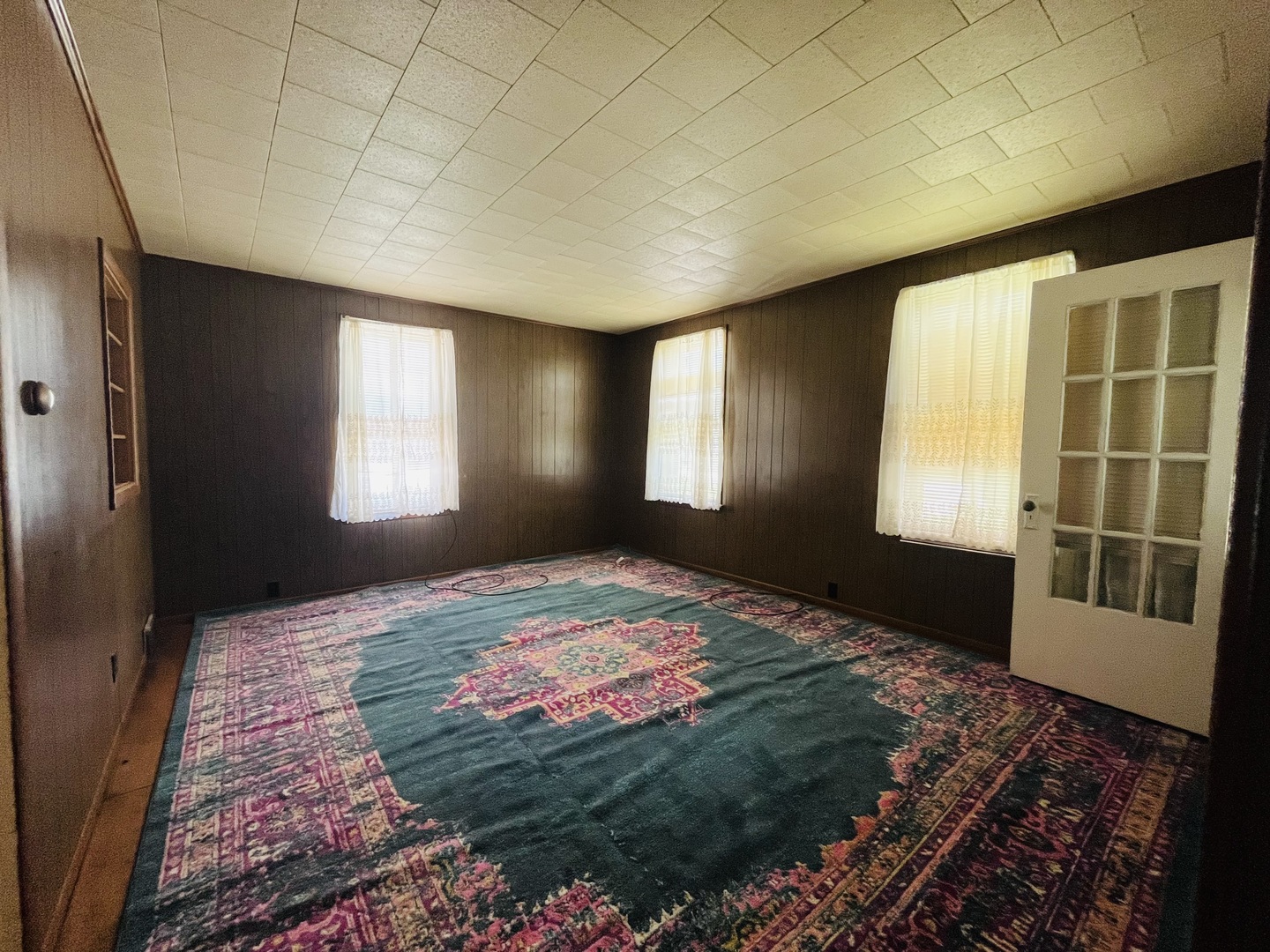 1213 East Main Street Streator, IL 61364 - Photo 4 of 18 a bedroom with a bed and a window