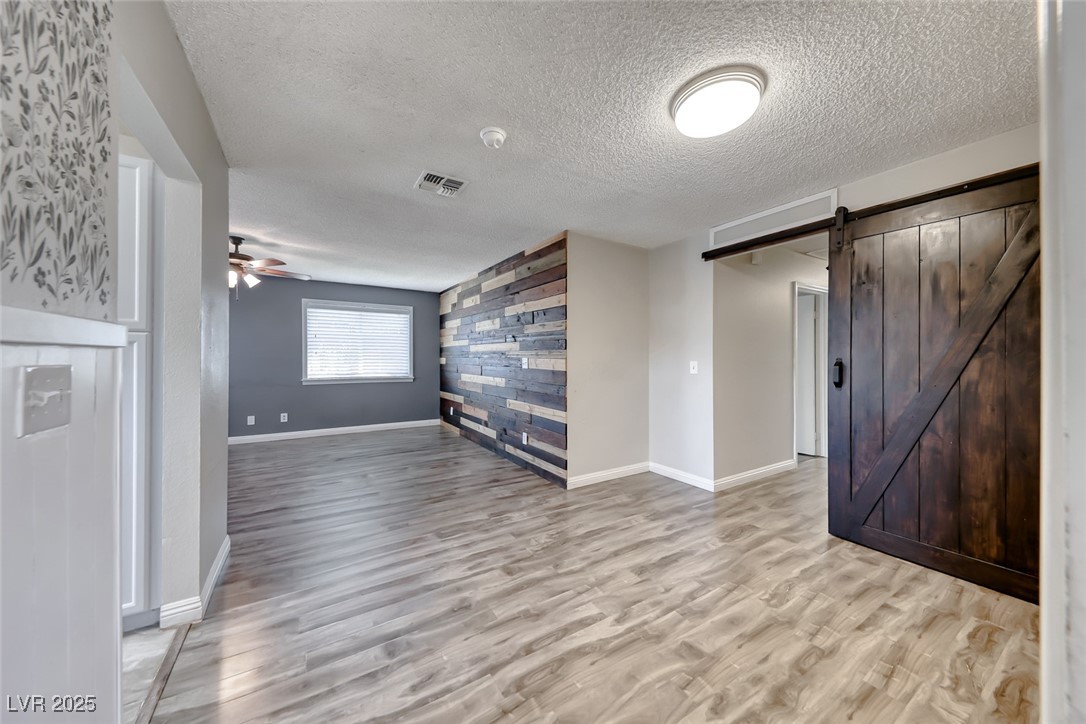 365 West Rochell Drive Henderson, NV 89015 - Photo 8 of 40 Barn Door For Hallway Leading To Bedrooms.