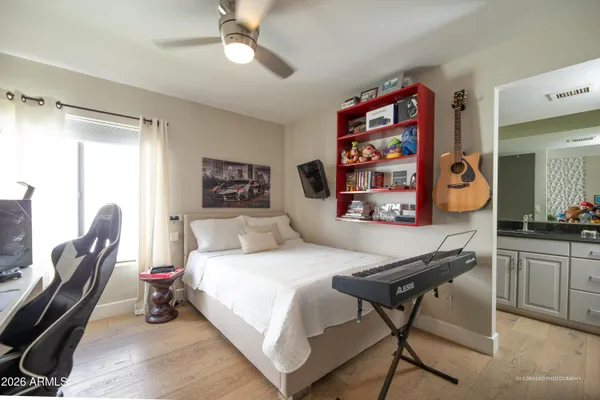 a bedroom with a bed and furniture