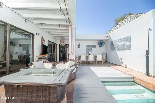 a front view of a house with a patio