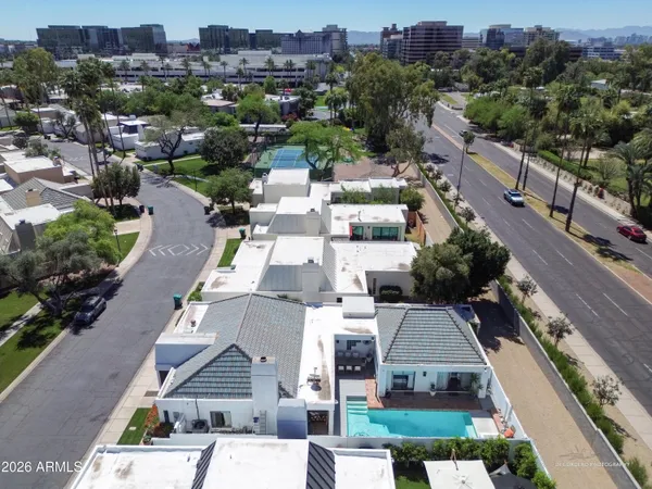 an aerial view of a house with outdoor space