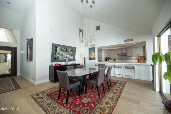 a view of a dining room with furniture